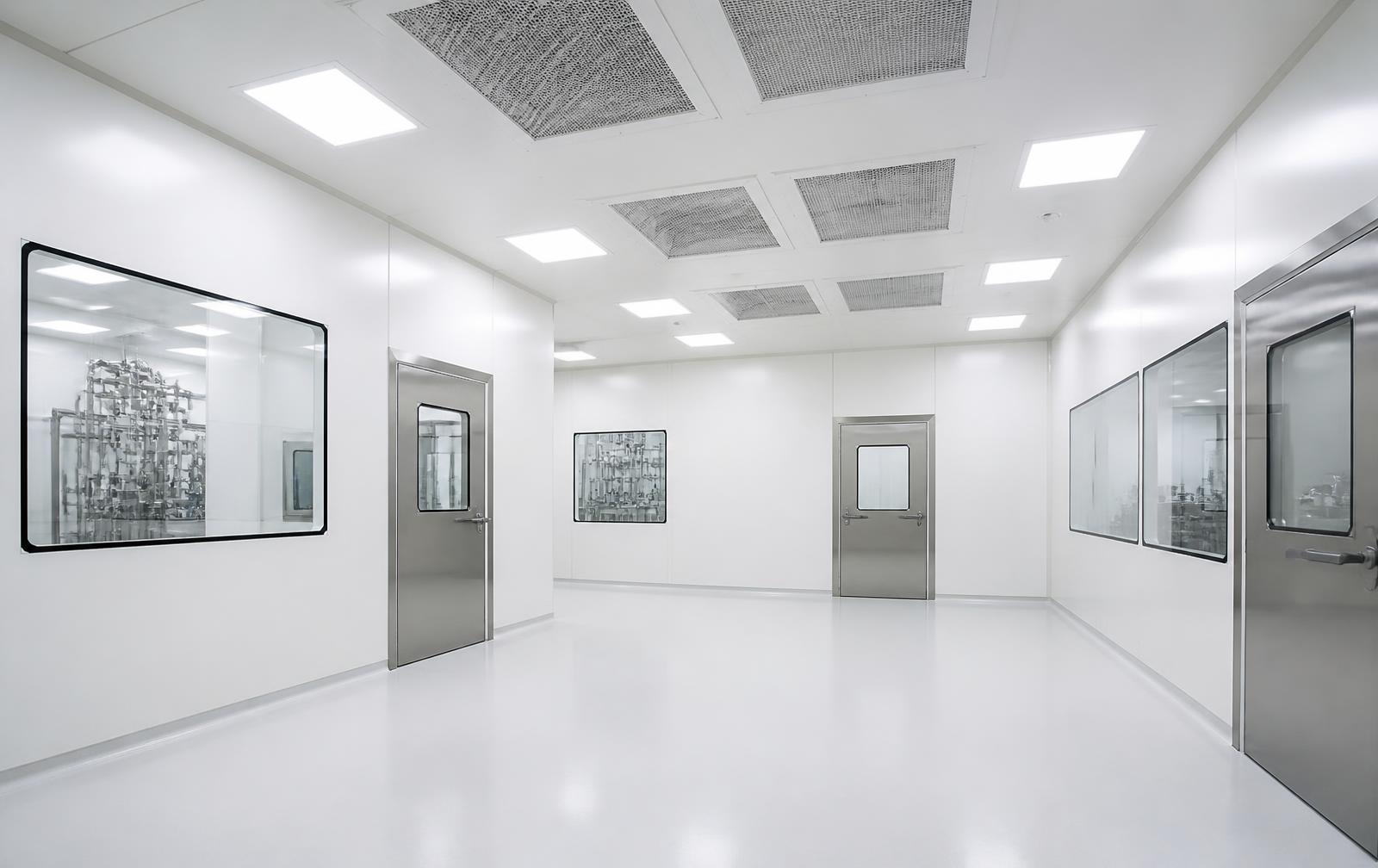 Newly built ISO classified cleanroom suite with white flooring and ceiling HEPA modules.